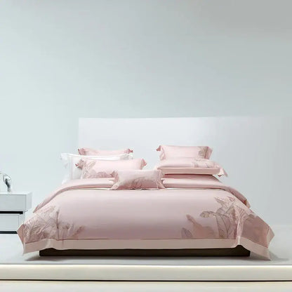 Pink satin bedding set with delicate leaf embroidery made from eucalyptus lyocell soft fabric for stylish decorbites decor