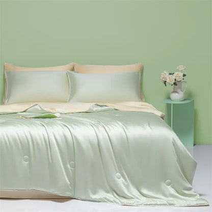 Light green and cream cool ice silk quilt set with pale green satin duvet cover and subtle button detailing by decorbites cool ice