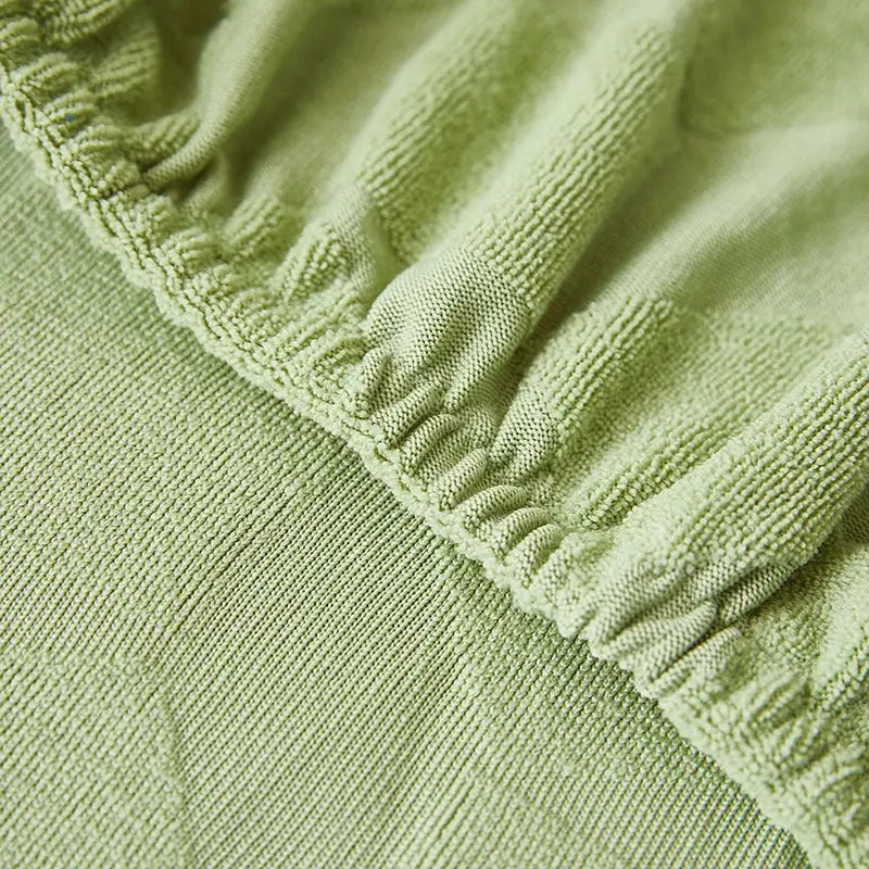 Light green hexagonal quilted jacquard sofa seat cover with ribbed elasticated edge for decorbites jacquard sofa
