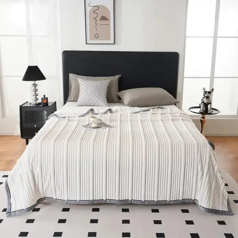 White ribbed quilted light luxury sofa blanket with gray border made of fleece for decorbites light luxury bedroom throw