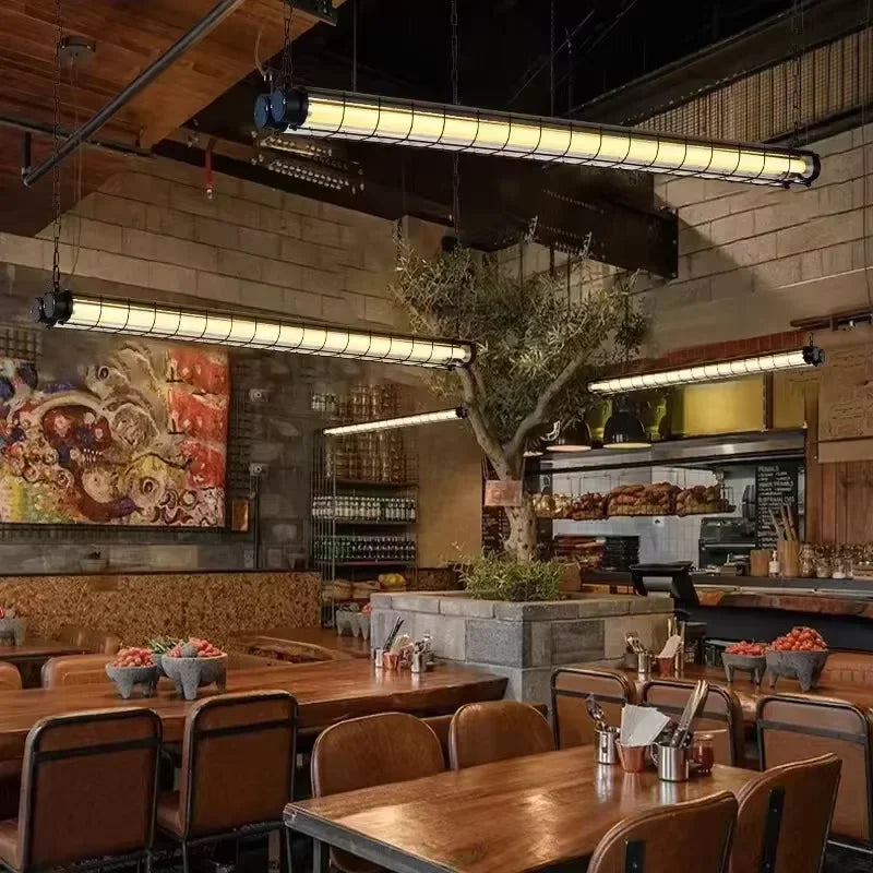 Industrial-style linear chandelier glass pendant lamp with long rectangular fixtures emitting warm yellow light