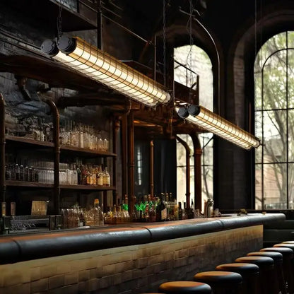 Industrial-style linear chandelier glass pendant lamp with warm glowing illumination and metal mesh cages
