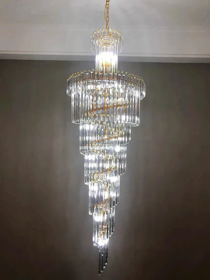 A multi-tiered long crystal staircase gold chandelier with cascading glass rods for hotel hall and luxury home decor