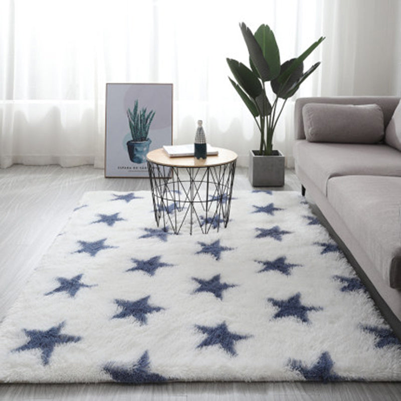 White star rug with blue stars made of plush polyester fiber featuring a gradient carpet design for living rooms and bedrooms