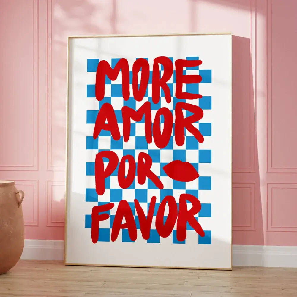A framed DecorBites™ wall art canvas featuring a bold red kind love quote on a blue and white checkered background
