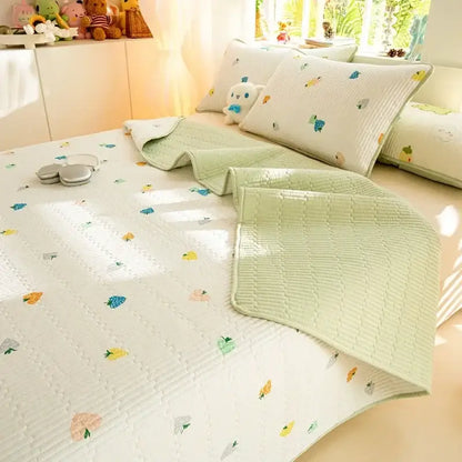 A soft light green cartoon pattern cotton mattress mat with colorful fruit motifs for bedroom decorbites