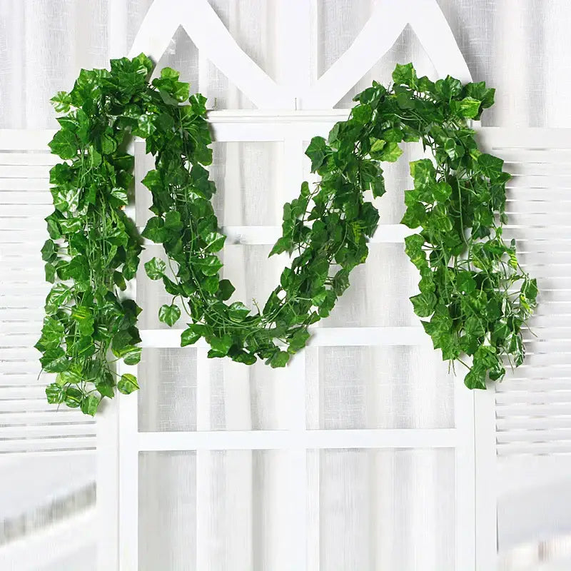 A lush green silk creeper plant vine with detailed leaves draped over a white lattice for living room decorbites decor