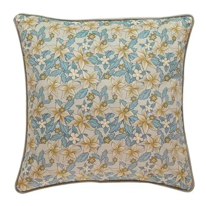 Luxe blue and gold camellia floral velvet cushion cover with delicate yellow and blue floral pattern on off-white background