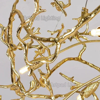 Golden luxe gold branch crystal led chandelier with branching metal arms and bird figurines for living room