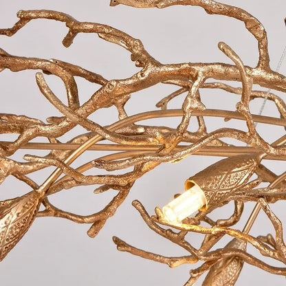 Luxe gold branch crystal led chandelier with intricate bird-shaped fixtures and textured metallic finish for living room
