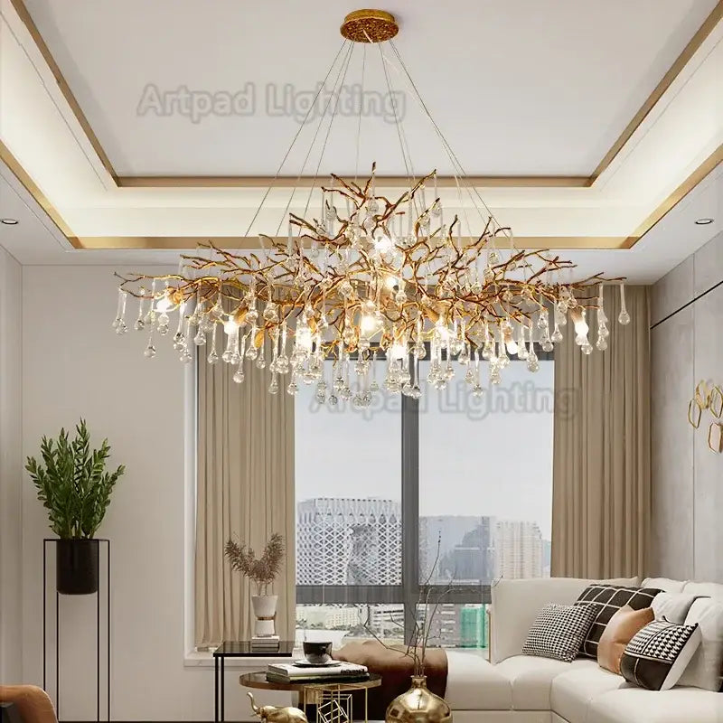 Luxe gold branch crystal led chandelier with crystal droplets and warm lighting for living room use