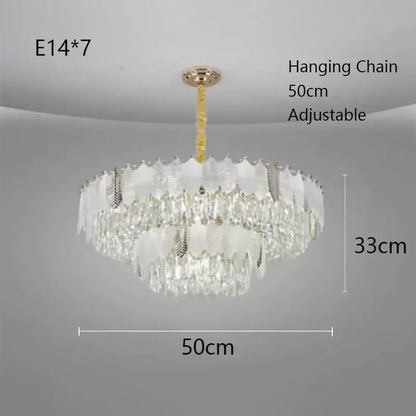 Elegant luxe gold crystal indoor chandelier with tiered clear and frosted glass design by decorbites crystal indoor