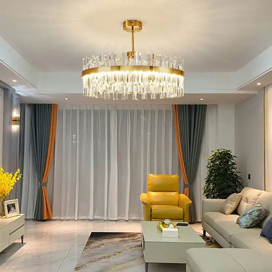 Luxe gold crystal round ceiling chandelier with cascading clear crystal prisms for dining room decorbites crystal round