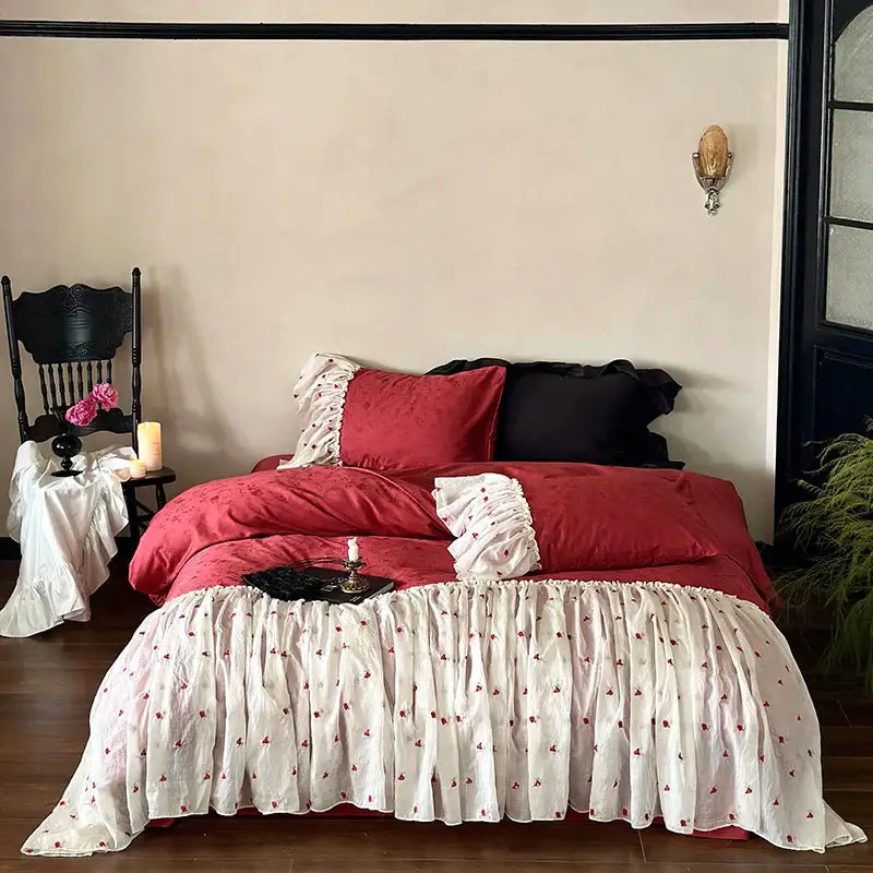 Luxe red and white egyptian cotton lace bedding set with ruffled edges and delicate floral embroidery for bedroom use