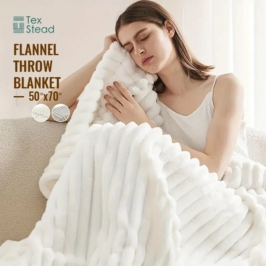 Luxe ribbed white flannel throw blanket featuring a plush textured surface ideal for bedroom decor and comfort