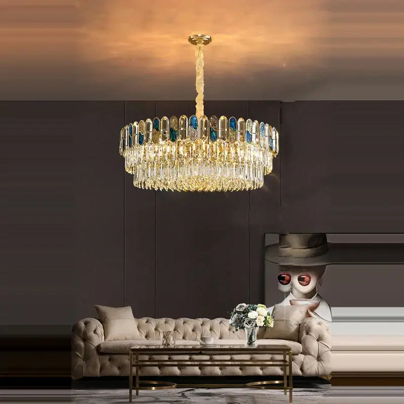 Gold-toned sea shell dimmable led chandelier with cascading crystal droplets and blue-tinted glass panels for living room decorbites dimmable led sea