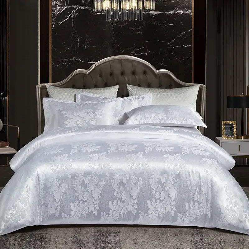 Elegant white satin duvet cover with silver floral damask pattern and matching pillows in decorbites jacquard satin bedding set