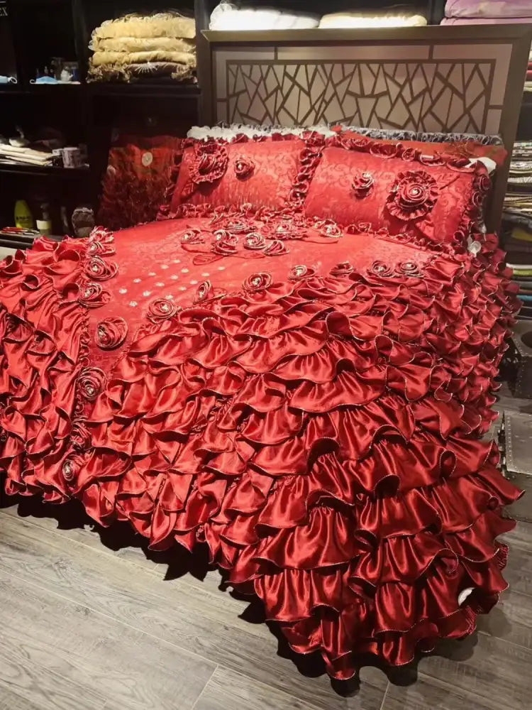Luxurious red satin bedding set with cascading ruffles and embroidered jacquard rose lace decorbites jacquard rose details