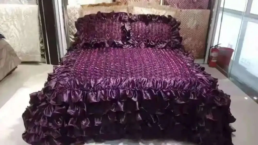 Purple satin ruffled bedspread with textured beaded center and fringe detailing in decorbites jacquard rose lace bedding set