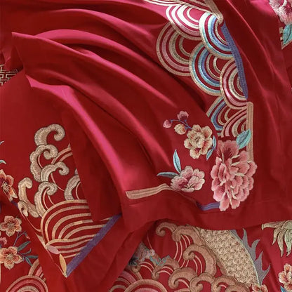 Luxurious red gold loong phoenix bedding set featuring rich crimson silk fabric with intricate gold pink blue floral embroidery