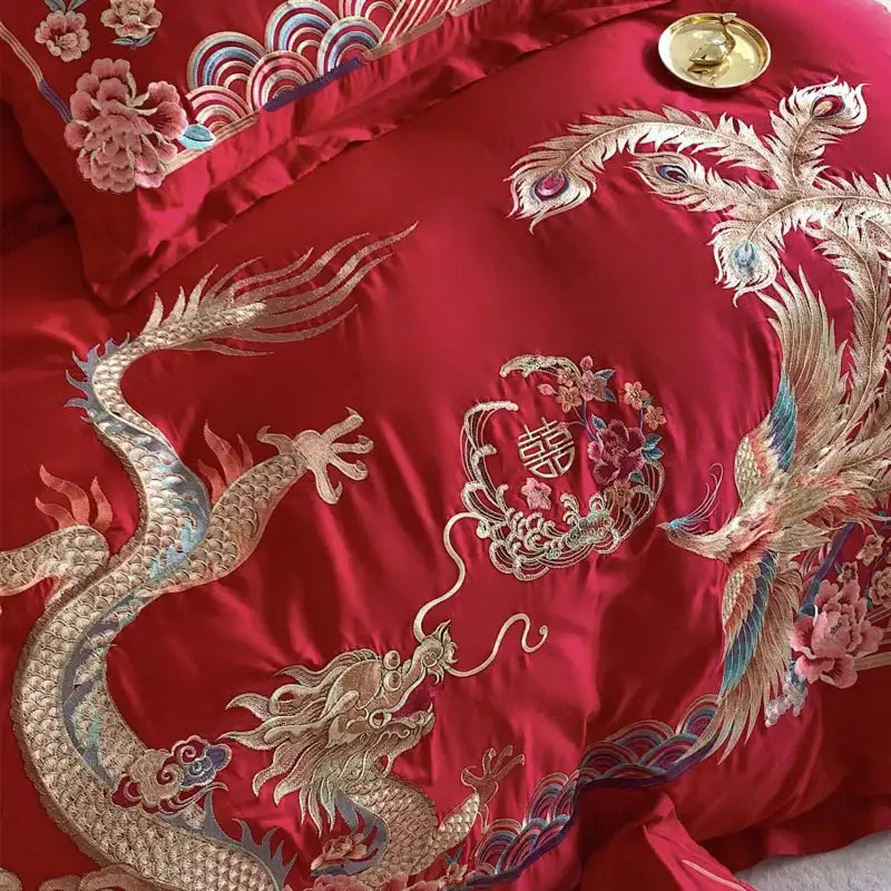 Luxurious red satin bedding set with gold loong phoenix embroidery and traditional double happiness symbol decorbites gold loong