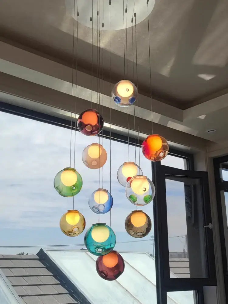 A luxury amber glass sphere pendant light with colorful translucent spheres for dining room dimmable LED decorbites clear glass decor