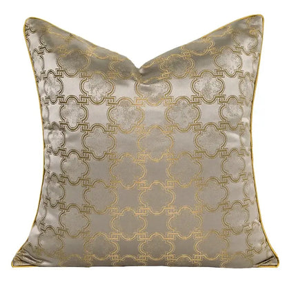 Luxury square pillow cover with metallic silver satin and decorbites gold quatrefoil geometric pattern and piping