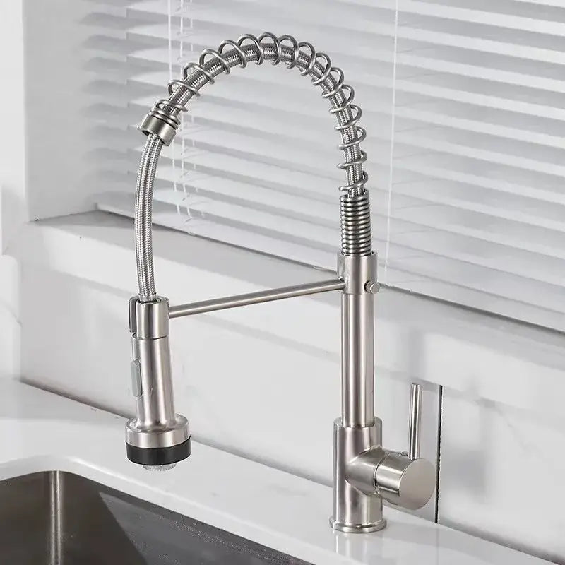 Luxury black and gold kitchen faucet with stainless steel flexible coiled gooseneck spout and pull out spray head by decorbites black