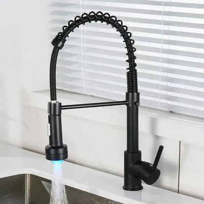 Luxury black and gold kitchen faucet with pull out spring hose and blue light decorbites black kitchen fixture