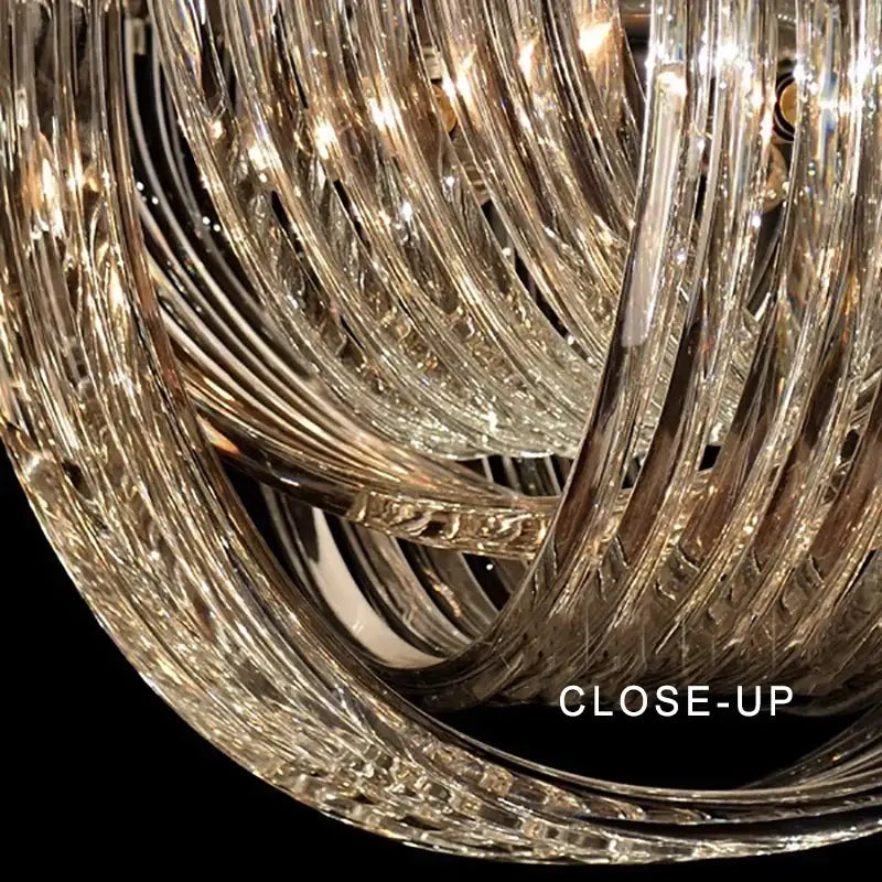 Luxury black stainless steel glass ribbon chandelier with twisted arms reflecting light for elegant living room decorbites black stainless