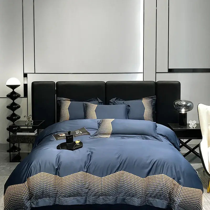Luxury blue and champagne bedding set with houndstooth border and gold accents in decorbites 1000tc cotton embroidery