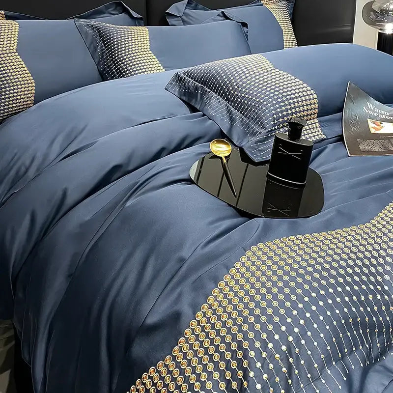Deep navy satin luxury bedding set with gold and silver 1000tc cotton embroidery edges from decorbites