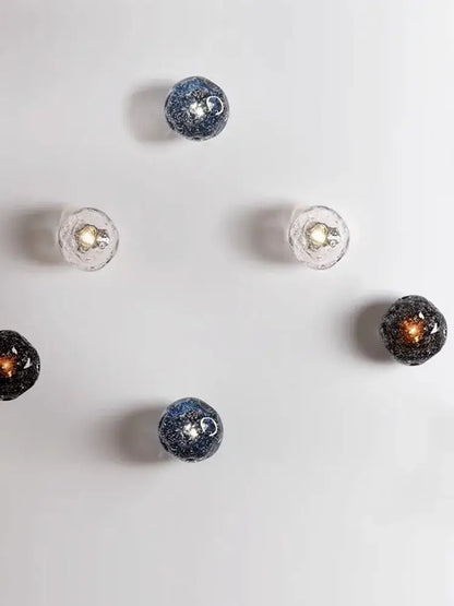 Luxury blue crystal glass wall lamp with spherical glitter fixtures and warm or cool-toned bulbs for elegant bedroom decorbites blue crystal