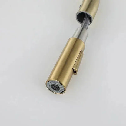 Luxury brushed gold pull out kitchen faucet with antique brass finish, sleek cylindrical design, and stainless steel accents by decorbites