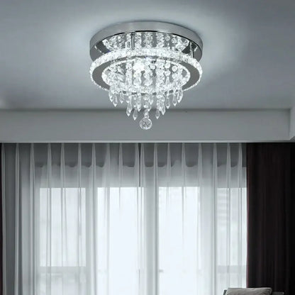 Luxury chrome crystal led ceiling chandelier with sleek chrome base and cascading clear glass droplets for dining room decorbites crystal led