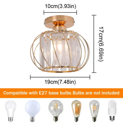 Luxury gold-toned ceiling chandelier with decorbites crystal led prisms and a warm glowing bulb for living room decor