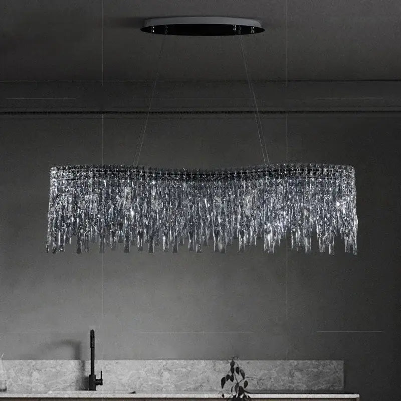 A modern luxury clear and purple crystal chrome chandelier with cascading prisms for dining room decorbites chrome chandelier