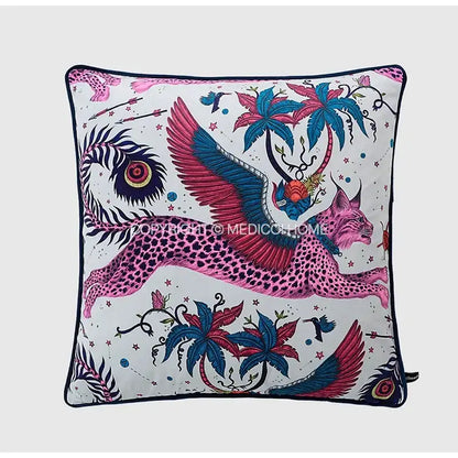 Luxury coral lynx velvet cushion cover with pink and teal embroidered winged creature and tropical decorbites coral lynx design