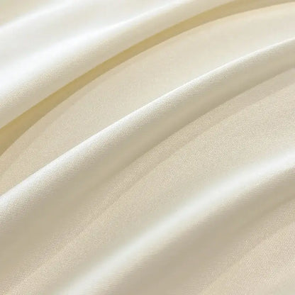 Luxury cream and pink ice silk floral bedding sets featuring cream-colored satin fabric with smooth glossy finish decorbites ice silk