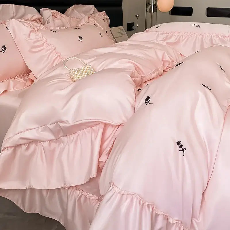 Luxury cream and pink ice silk bedding set with pink satin fabric black rose embroidery and ruffled edges by decorbites ice silk