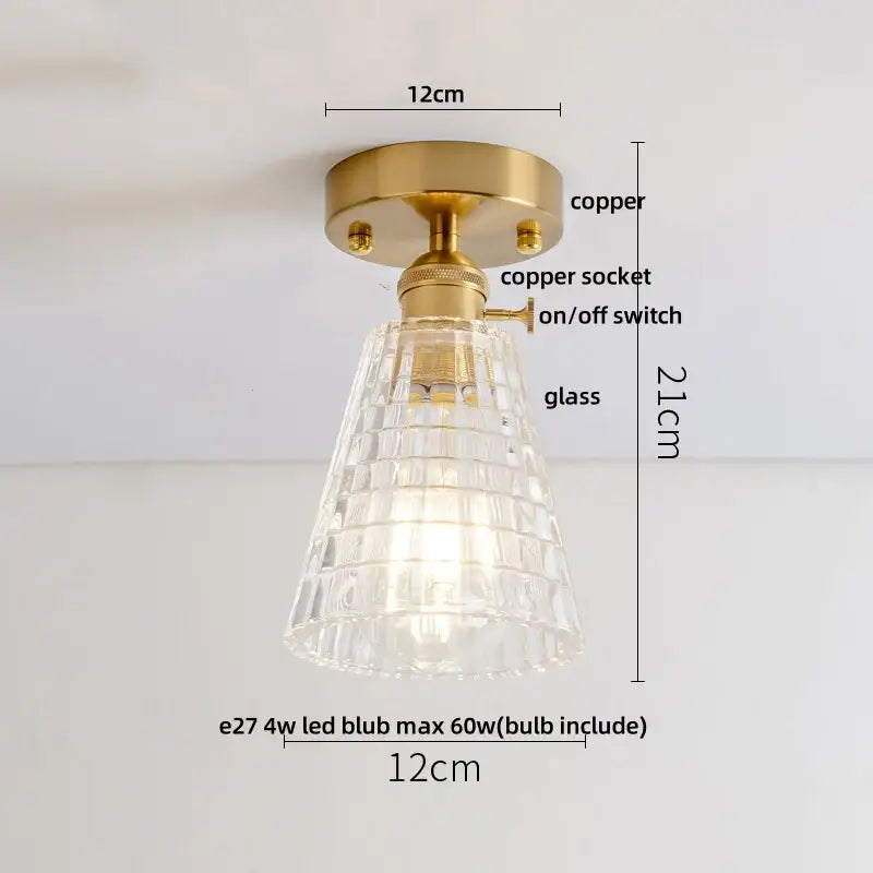 A clear faceted glass ceiling lamp with brass copper-finished base from decorbites glass grid collection for living room decor