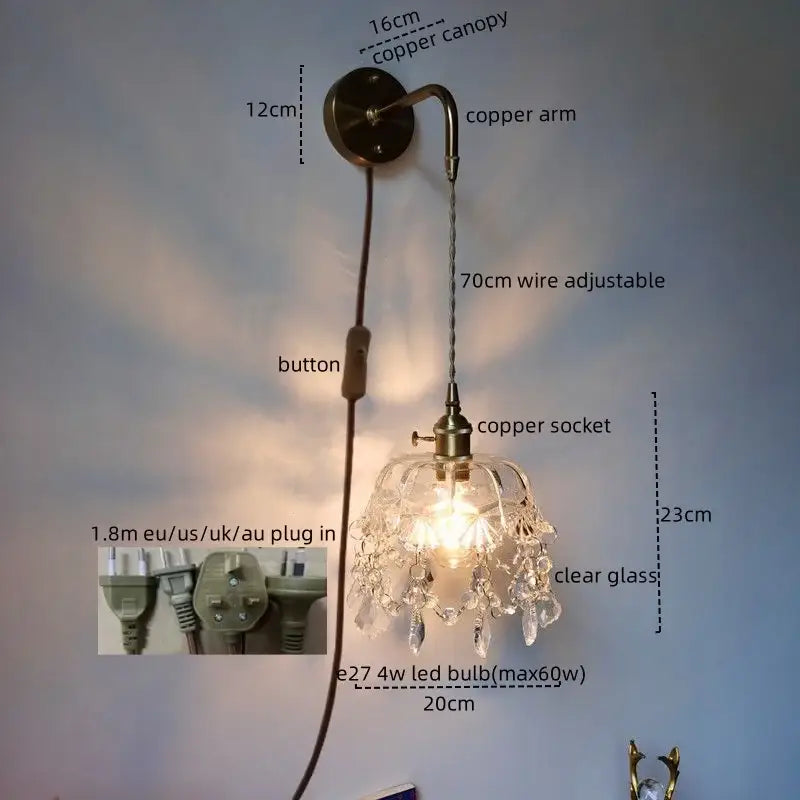 Luxury crystal copper led wall sconce with clear glass shade and dangling crystal droplets for bedroom lighting