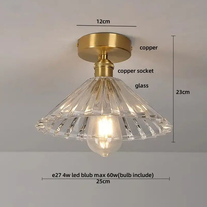 A clear faceted crystal glass luxury ceiling light with brass copper finished mounting base for bedroom decorbites decor