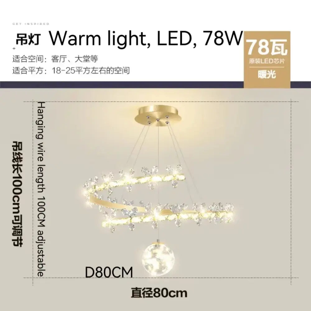 Luxury crystal gold ceiling chandelier with gold-toned spiral, crystal accents, spherical pendant, and warm led lighting