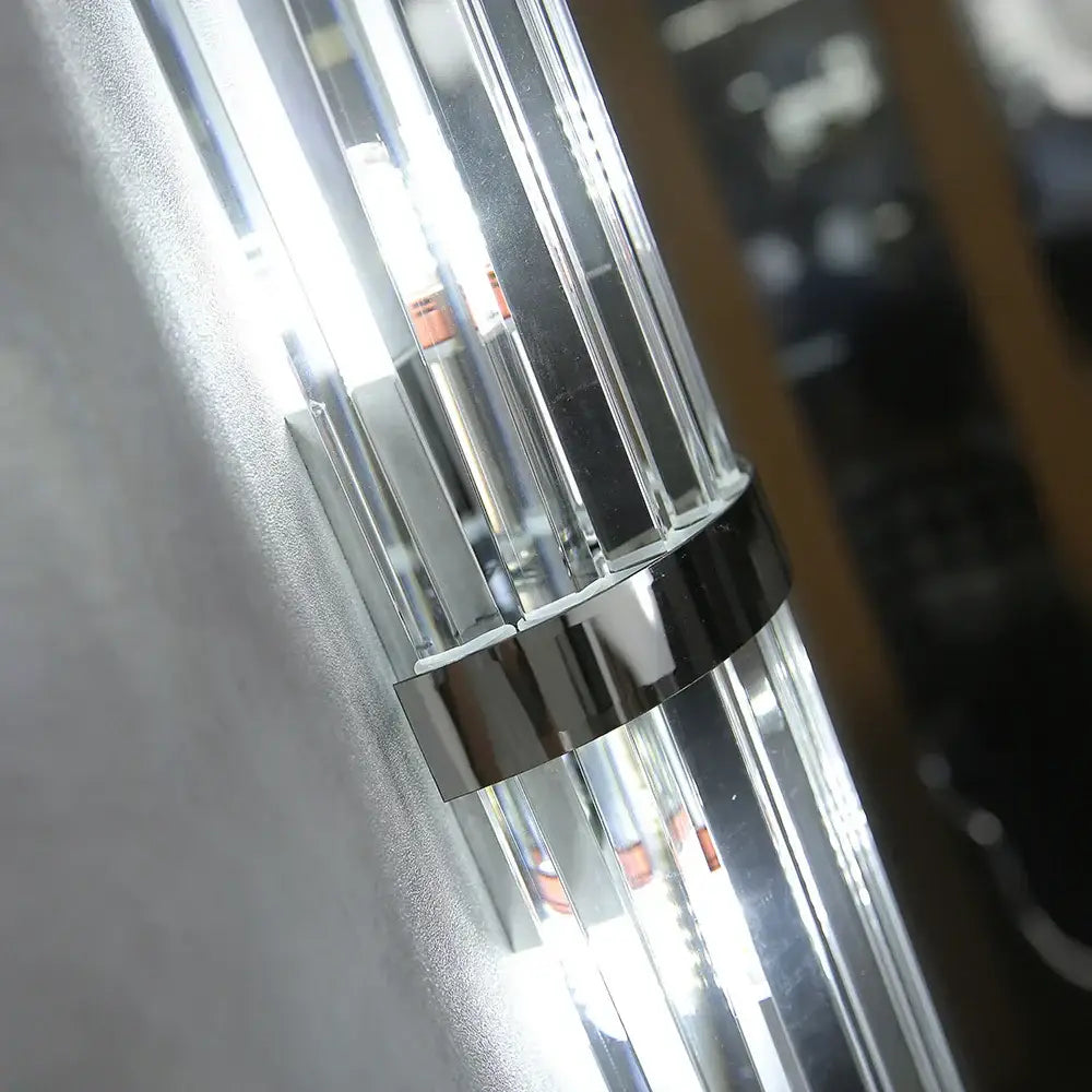 Luxury crystal golden wall lamp featuring a chrome-finished cylindrical wall sconce with clear glass prisms decorbites crystal golden