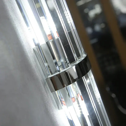 Luxury crystal golden wall lamp featuring a chrome-finished cylindrical wall sconce with clear glass prisms decorbites crystal golden