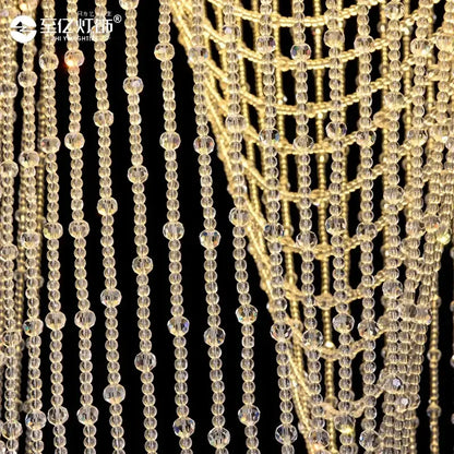 Golden chandelier with cascading clear faceted crystal beads in white decorbites crystal tassel stair chandelier design