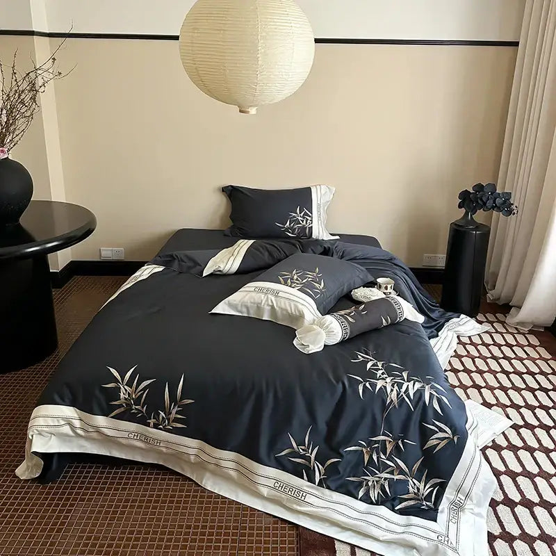 Luxury dark blue bedding set with elegant white bamboo embroidery and cherish trim made from 1000tc Egyptian cotton