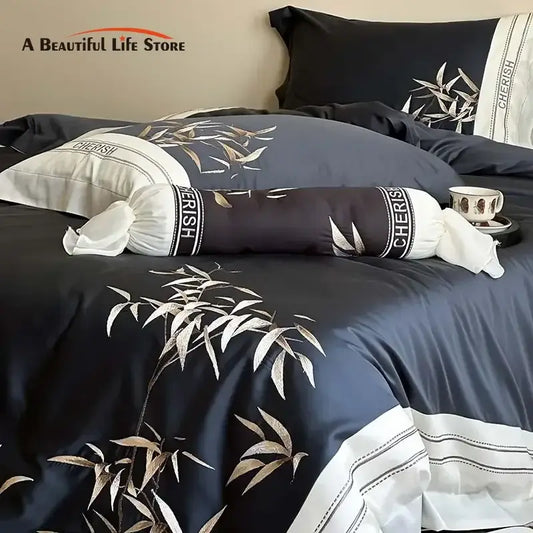 Dark blue satin duvet cover with white and gold bamboo embroidery in a 1000tc egyptian cotton bedding set