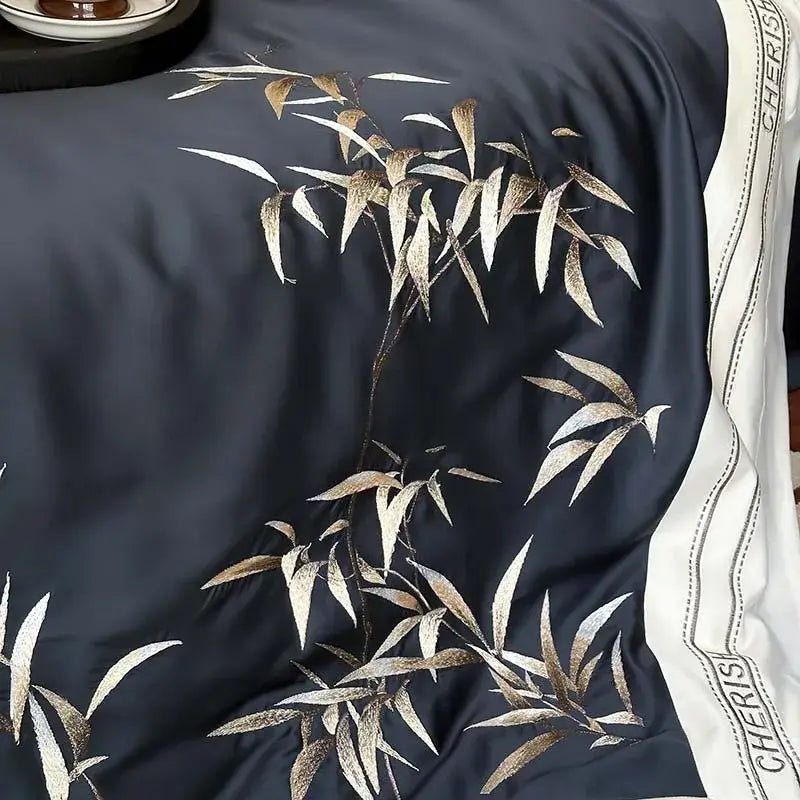 Luxury dark blue silk scarf with gold and white bamboo leaf embroidery complements 1000tc Egyptian cotton bedding set
